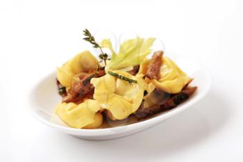 Italian cuisine - Stuffed pasta and mushrooms  