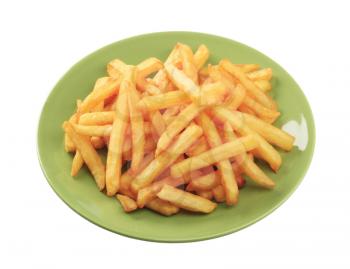 Heap of French fries on a green plate