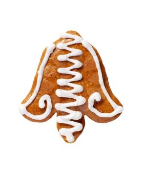 Bell-shaped gingerbread cookie isolated on white background      