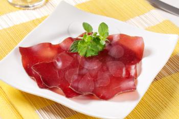 Thin slices of dry cured meat