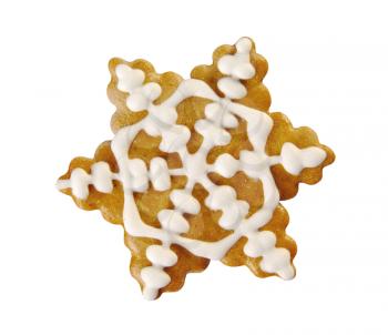 Gingerbread snowflake decorated with sugar icing
