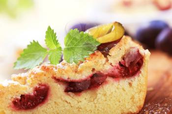 Slice of plum cake with crumb topping