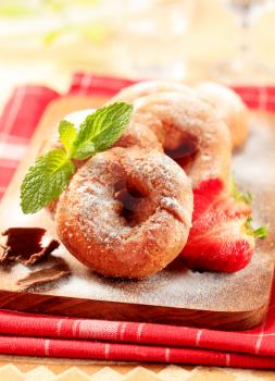 Ring doughnuts sprinkled with icing sugar