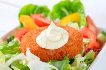 Fried breaded cheese with mayonnaise