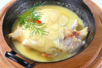 Pan-seared white fish with rich  sauce