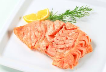 Juicy cooked salmon with lemon