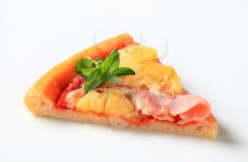 Slice of fresh baked Pizza Hawaii