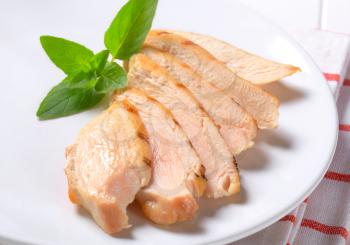 Slices of grilled chicken breast fillet