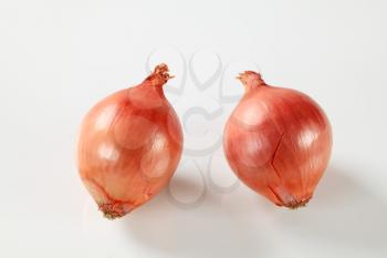 Raw red onions - studio shot