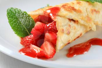 Crepe filled with fresh strawberries 
