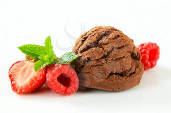 Scoop of chocolate ice cream with fresh raspberries