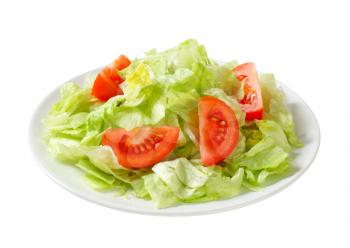 Ice lettuce leaves with tomato wedges