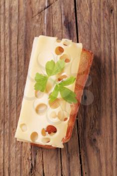 Thin slice of Emmentaler cheese on toast 