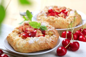 Crisp Danish pastries topped with fresh cherries