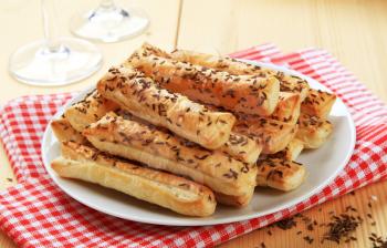 Puff Pastry Straws with caraway seeds on top