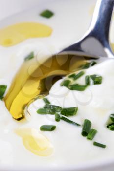 Detail of cream dipping sauce with fresh chives