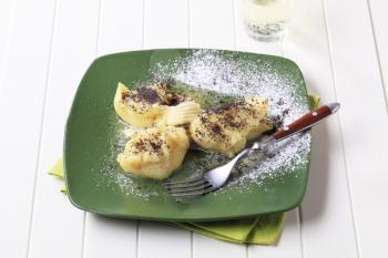 Lumps of potato puree with poppyseed and sugar