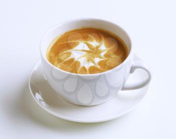 Cup of latte with froth art