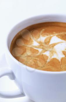 Cup of latte with froth art