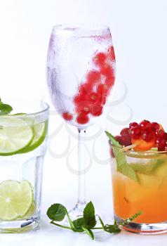 Iced drinks garnished with fresh fruit 