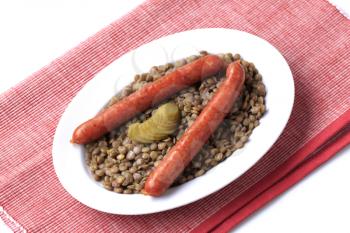 Lentils with spicy sausages and pickle