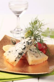 Blue cheese and fresh vegetables garnished with dill