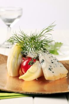 Blue cheese and fresh vegetables garnished with dill