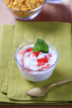 Bowl of yogurt with strawberry jam