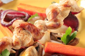 Chicken skewer with vegetables and mushrooms