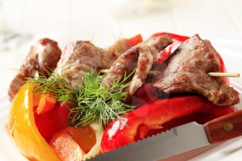 Grilled meat on skewer with bell peppers