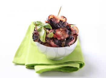 Bowl of bacon wrapped prunes - studio
