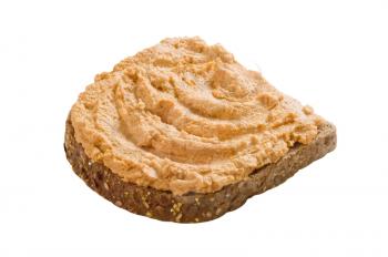 Slice of whole grain bread with spread
