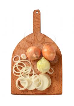 Fresh onion on a wooden cutting board 