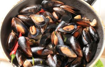 Steamed mussels in a pan