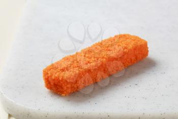 Closeup of breaded fish finger