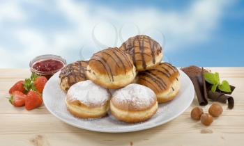 Donuts with strawberry jam and chocolate fillings

