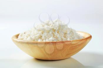 Boiled white rice in a wooden bowl