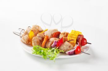 Grilled meat and vegetables on skewers