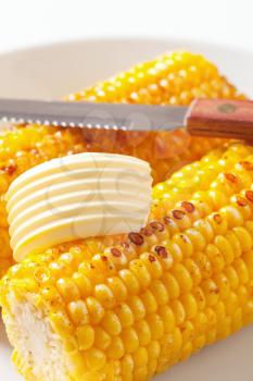 Roasted corn on the cob with butter