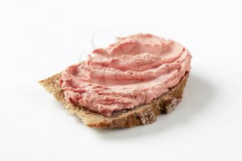 Slice of bread with smooth liver pate