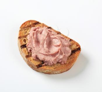 Slice of toasted bread and liver pate