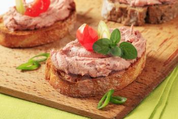 Slices of toasted bread with delicious liver pate