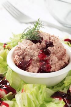 Delicious liver mousse topped with cranberry sauce 