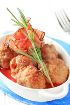 Meatballs with tomato sauce in a casserole dish