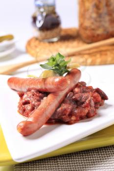 Red bean chili and sausages - closeup