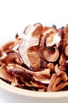 Bowl of dried mushrooms cut into slices
