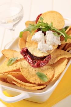 Corn chips, feta and sun dried tomatoes
