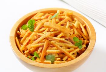 Pancake strips in a wooden bowl