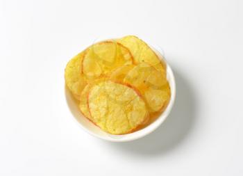 Heap of potato chips in a bowl