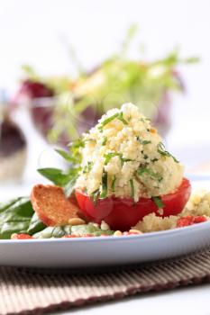 Vegetarian appetizer - Tomato stuffed with couscous